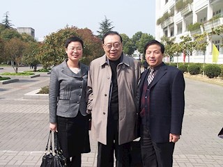 国家总督学、中国民办教育学会会长陶西平（中）与我校领导合影